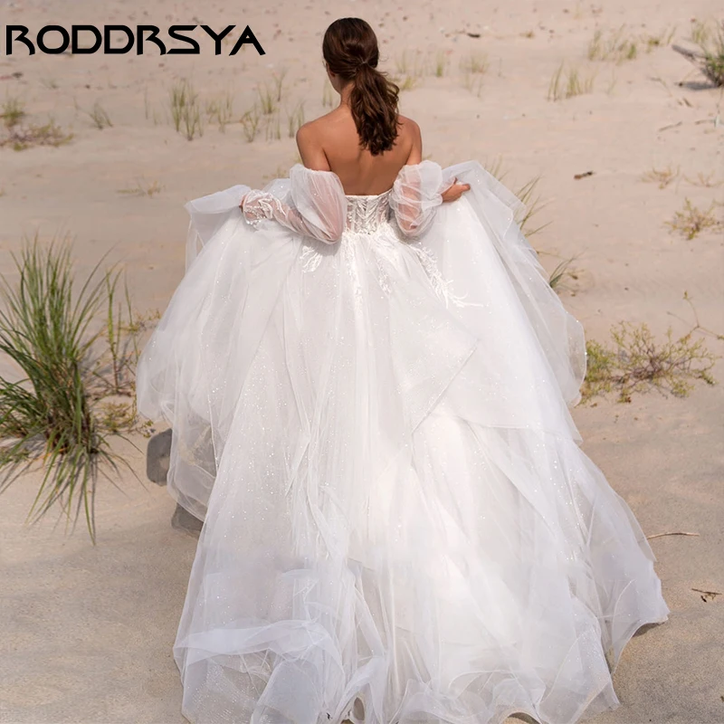RODDRSYA רומנטי סטרפלס פנס שרוול שמלת חתונה אלגנטית אפליקציות קו שמלות כלה סקסית חשופת גב טול כלת המסיבה. התמונה 1